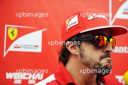 Fernando Alonso (ESP) Ferrari with the media. 18.09.2014. Formula 1 World Championship, Rd 14, Singapore Grand Prix, Singapore, Singapore, Preparation Day.