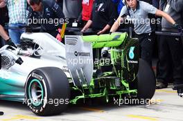 Nico Rosberg (GER) Mercedes AMG F1 W05 running flow-vis paint on the rear wing and rear diffuser. 08.07.2014. Formula One Testing, Silverstone, England, Tuesday.