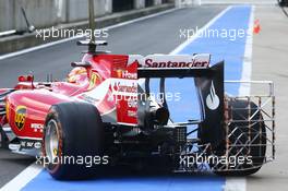 Jules Bianchi (FRA) Ferrari F14-T Test Driver running sensor equipment. 09.07.2014. Formula One Testing, Silverstone, England, Wednesday.