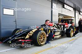 Paul Hembery (GBR) Pirelli Motorsport Director with the Lotus F1 E22 with new 18 inch Pirelli tyres and rims. 09.07.2014. Formula One Testing, Silverstone, England, Wednesday.