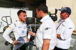 (L to R): Will Stevens (GBR) Caterham CT05 with Will Buxton (GBR) NBS Sports Network TV Presenter and Jason Swales (GBR) NBC Sports Network. 21.11.2014. Formula 1 World Championship, Rd 19, Abu Dhabi Grand Prix, Yas Marina Circuit, Abu Dhabi, Practice Day.