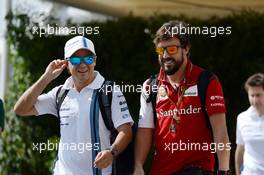 (L to R): Felipe Massa (BRA) Williams with Fernando Alonso (ESP) Ferrari. 21.11.2014. Formula 1 World Championship, Rd 19, Abu Dhabi Grand Prix, Yas Marina Circuit, Abu Dhabi, Practice Day.