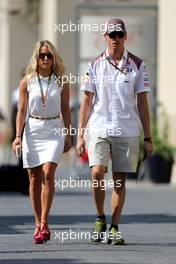 Adrian Sutil (GER), Sauber F1 Team and his girlfriend 21.11.2014. Formula 1 World Championship, Rd 19, Abu Dhabi Grand Prix, Yas Marina Circuit, Abu Dhabi, Practice Day.