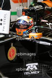 Sergio Perez (MEX) Sahara Force India F1 VJM07 in the pits. 21.11.2014. Formula 1 World Championship, Rd 19, Abu Dhabi Grand Prix, Yas Marina Circuit, Abu Dhabi, Practice Day.