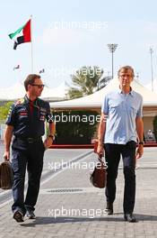 (L to R): Christian Horner (GBR) Red Bull Racing Team Principal with Mario Illien (SUI) Ilmor Engineering Co-Founder. 21.11.2014. Formula 1 World Championship, Rd 19, Abu Dhabi Grand Prix, Yas Marina Circuit, Abu Dhabi, Practice Day.