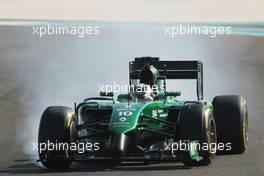 Kamui Kobayashi (JPN) Caterham CT05 locks up under braking. 21.11.2014. Formula 1 World Championship, Rd 19, Abu Dhabi Grand Prix, Yas Marina Circuit, Abu Dhabi, Practice Day.