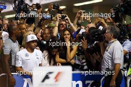 Nick Hamilton, Anthony Hamilton (GBR) and Nicole Scherzinger (USA) Singer in parc ferme. 23.11.2014. Formula 1 World Championship, Rd 19, Abu Dhabi Grand Prix, Yas Marina Circuit, Abu Dhabi, Race Day.