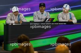 The post race FIA Press Conference (L to R): Felipe Massa (BRA) Williams, second; Lewis Hamilton (GBR) Mercedes AMG F1, race winner and World Champion; Valtteri Bottas (FIN) Williams, third. 23.11.2014. Formula 1 World Championship, Rd 19, Abu Dhabi Grand Prix, Yas Marina Circuit, Abu Dhabi, Race Day.