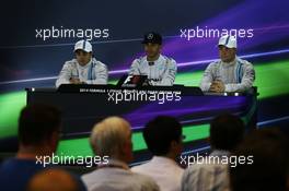 The post race FIA Press Conference (L to R): Felipe Massa (BRA) Williams, second; Lewis Hamilton (GBR) Mercedes AMG F1, race winner and World Champion; Valtteri Bottas (FIN) Williams, third. 23.11.2014. Formula 1 World Championship, Rd 19, Abu Dhabi Grand Prix, Yas Marina Circuit, Abu Dhabi, Race Day.