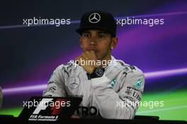 Race winner and World Champion Lewis Hamilton (GBR) Mercedes AMG F1 in the FIA Press Conference. 23.11.2014. Formula 1 World Championship, Rd 19, Abu Dhabi Grand Prix, Yas Marina Circuit, Abu Dhabi, Race Day.
