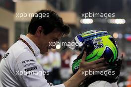 Felipe Massa (BRA) Williams celebrates his second position in parc ferme with Toto Wolff (GER) Mercedes AMG F1 Shareholder and Executive Director. 23.11.2014. Formula 1 World Championship, Rd 19, Abu Dhabi Grand Prix, Yas Marina Circuit, Abu Dhabi, Race Day.