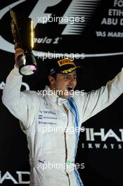 Felipe Massa (BRA) Williams celebrates his second position on the podium. 23.11.2014. Formula 1 World Championship, Rd 19, Abu Dhabi Grand Prix, Yas Marina Circuit, Abu Dhabi, Race Day.