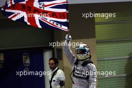 Race winner and World Champion Lewis Hamilton (GBR) Mercedes AMG F1 celebrates in parc ferme. 23.11.2014. Formula 1 World Championship, Rd 19, Abu Dhabi Grand Prix, Yas Marina Circuit, Abu Dhabi, Race Day.