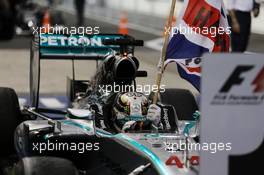 Race winner and World Champion Lewis Hamilton (GBR) Mercedes AMG F1 W05 celebrates in parc ferme. 23.11.2014. Formula 1 World Championship, Rd 19, Abu Dhabi Grand Prix, Yas Marina Circuit, Abu Dhabi, Race Day.