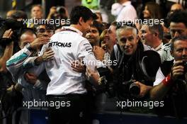 Toto Wolff (GER) Mercedes AMG F1 Shareholder and Executive Director celebrates with the media in parc ferme. 23.11.2014. Formula 1 World Championship, Rd 19, Abu Dhabi Grand Prix, Yas Marina Circuit, Abu Dhabi, Race Day.