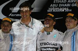 1st place and World Champion Lewis Hamilton (GBR) Mercedes AMG F1 W05, 2nd place Felipe Massa (BRA) Williams FW36 and 3rd place Valtteri Bottas (FIN) Williams FW36. 23.11.2014. Formula 1 World Championship, Rd 19, Abu Dhabi Grand Prix, Yas Marina Circuit, Abu Dhabi, Race Day.