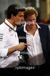 (L to R): Toto Wolff (GER) Mercedes AMG F1 Shareholder and Executive Director with HRH Prince Harry (GBR). 23.11.2014. Formula 1 World Championship, Rd 19, Abu Dhabi Grand Prix, Yas Marina Circuit, Abu Dhabi, Race Day.