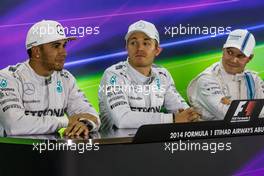 The post qualifying FIA Press Conference (L to R): Lewis Hamilton (GBR) Mercedes AMG F1, second; Nico Rosberg (GER) Mercedes AMG F1, pole position; Valtteri Bottas (FIN) Williams, third. 22.11.2014. Formula 1 World Championship, Rd 19, Abu Dhabi Grand Prix, Yas Marina Circuit, Abu Dhabi, Qualifying Day.