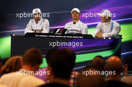 The post qualifying FIA Press Conference (L to R): Lewis Hamilton (GBR) Mercedes AMG F1, second; Nico Rosberg (GER) Mercedes AMG F1, pole position; Valtteri Bottas (FIN) Williams, third. 22.11.2014. Formula 1 World Championship, Rd 19, Abu Dhabi Grand Prix, Yas Marina Circuit, Abu Dhabi, Qualifying Day.