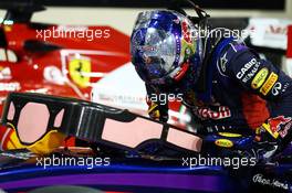 Sebastian Vettel (GER) Red Bull Racing RB10 with a message of thanks on his helmet. 22.11.2014. Formula 1 World Championship, Rd 19, Abu Dhabi Grand Prix, Yas Marina Circuit, Abu Dhabi, Qualifying Day.