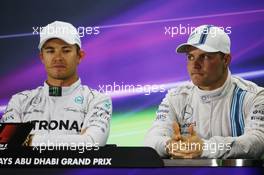 (L to R): Nico Rosberg (GER) Mercedes AMG F1 with Valtteri Bottas (FIN) Williams in the FIA Press Conference. 22.11.2014. Formula 1 World Championship, Rd 19, Abu Dhabi Grand Prix, Yas Marina Circuit, Abu Dhabi, Qualifying Day.