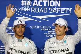 Lewis Hamilton (GBR), Mercedes AMG F1 Team and Nico Rosberg (GER), Mercedes AMG F1 Team  22.11.2014. Formula 1 World Championship, Rd 19, Abu Dhabi Grand Prix, Yas Marina Circuit, Abu Dhabi, Qualifying Day.