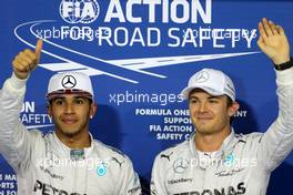 Lewis Hamilton (GBR), Mercedes AMG F1 Team and Nico Rosberg (GER), Mercedes AMG F1 Team  22.11.2014. Formula 1 World Championship, Rd 19, Abu Dhabi Grand Prix, Yas Marina Circuit, Abu Dhabi, Qualifying Day.