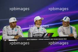 The post qualifying FIA Press Conference (L to R): Lewis Hamilton (GBR) Mercedes AMG F1, second; Nico Rosberg (GER) Mercedes AMG F1, pole position; Valtteri Bottas (FIN) Williams, third. 22.11.2014. Formula 1 World Championship, Rd 19, Abu Dhabi Grand Prix, Yas Marina Circuit, Abu Dhabi, Qualifying Day.