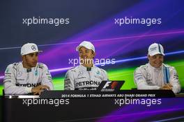 The post qualifying FIA Press Conference (L to R): Lewis Hamilton (GBR) Mercedes AMG F1, second; Nico Rosberg (GER) Mercedes AMG F1, pole position; Valtteri Bottas (FIN) Williams, third. 22.11.2014. Formula 1 World Championship, Rd 19, Abu Dhabi Grand Prix, Yas Marina Circuit, Abu Dhabi, Qualifying Day.