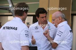 Toto Wolff (GER) Mercedes AMG F1 Shareholder and Executive Director (Centre) with Dr. Dieter Zetsche (GER) Daimler AG CEO (Right). 23.11.2014. Formula 1 World Championship, Rd 19, Abu Dhabi Grand Prix, Yas Marina Circuit, Abu Dhabi, Race Day.