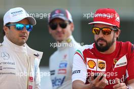 Fernando Alonso (ESP), Scuderia Ferrari and Felipe Massa (BRA), Williams F1 Team  23.11.2014. Formula 1 World Championship, Rd 19, Abu Dhabi Grand Prix, Yas Marina Circuit, Abu Dhabi, Race Day.