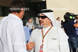 (L to R): Gerhard Berger (AUT) with HRH Prince Salman bin Hamad Al Khalifa, Crown Prince of Bahrain. 23.11.2014. Formula 1 World Championship, Rd 19, Abu Dhabi Grand Prix, Yas Marina Circuit, Abu Dhabi, Race Day.