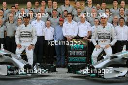 (L to R): Lewis Hamilton (GBR) Mercedes AMG F1 and team mate Nico Rosberg (GER) Mercedes AMG F1 at a team photograph. 23.11.2014. Formula 1 World Championship, Rd 19, Abu Dhabi Grand Prix, Yas Marina Circuit, Abu Dhabi, Race Day.