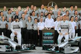 (L to R): Lewis Hamilton (GBR) Mercedes AMG F1 and team mate Nico Rosberg (GER) Mercedes AMG F1 at a team photograph. 23.11.2014. Formula 1 World Championship, Rd 19, Abu Dhabi Grand Prix, Yas Marina Circuit, Abu Dhabi, Race Day.