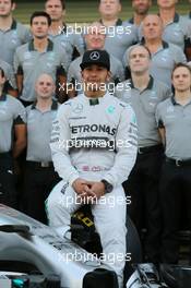Lewis Hamilton (GBR) Mercedes AMG F1 at a team photograph. 23.11.2014. Formula 1 World Championship, Rd 19, Abu Dhabi Grand Prix, Yas Marina Circuit, Abu Dhabi, Race Day.