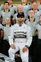 Lewis Hamilton (GBR) Mercedes AMG F1 at a team photograph. 23.11.2014. Formula 1 World Championship, Rd 19, Abu Dhabi Grand Prix, Yas Marina Circuit, Abu Dhabi, Race Day.