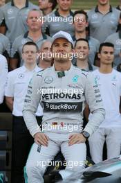 Nico Rosberg (GER) Mercedes AMG F1 at a team photograph. 23.11.2014. Formula 1 World Championship, Rd 19, Abu Dhabi Grand Prix, Yas Marina Circuit, Abu Dhabi, Race Day.