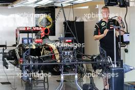 A Lotus F1 E22 is prepared in the pits. 20.11.2014. Formula 1 World Championship, Rd 19, Abu Dhabi Grand Prix, Yas Marina Circuit, Abu Dhabi, Preparation Day.