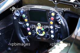 Lotus F1 E22 steering wheel. 20.11.2014. Formula 1 World Championship, Rd 19, Abu Dhabi Grand Prix, Yas Marina Circuit, Abu Dhabi, Preparation Day.