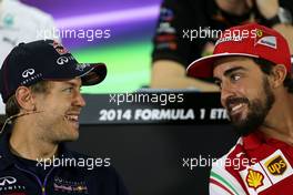 Sebastian Vettel (GER), Red Bull Racing and Fernando Alonso (ESP), Scuderia Ferrari  20.11.2014. Formula 1 World Championship, Rd 19, Abu Dhabi Grand Prix, Yas Marina Circuit, Abu Dhabi, Preparation Day.