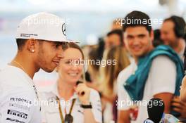Lewis Hamilton (GBR) Mercedes AMG F1 with the media. 20.11.2014. Formula 1 World Championship, Rd 19, Abu Dhabi Grand Prix, Yas Marina Circuit, Abu Dhabi, Preparation Day.