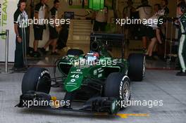 Will Stevens (GBR) Caterham CT05 leaves the pits. 25.11.2014. Formula 1 Testing, Day One, Yas Marina Circuit, Abu Dhabi, Tuesday.