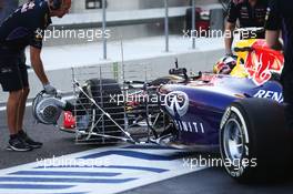 Carlos Sainz Jnr (ESP) Red Bull Racing RB10 Test Driver running sensor equipment. 25.11.2014. Formula 1 Testing, Day One, Yas Marina Circuit, Abu Dhabi, Tuesday.