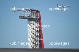 A plane flies past the viewing tower. 31.10.2014. Formula 1 World Championship, Rd 17, United States Grand Prix, Austin, Texas, USA, Practice Day.