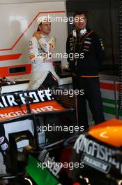 Nico Hulkenberg (GER) Sahara Force India F1 with Bradley Joyce (GBR) Sahara Force India F1 Race Engineer. 31.10.2014. Formula 1 World Championship, Rd 17, United States Grand Prix, Austin, Texas, USA, Practice Day.