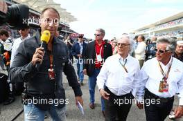 Kai Ebel (GER) RTL TV Presenter with Bernie Ecclestone (GBR) and Mario Andretti (USA) Circuit of The Americas' Official Ambassador on the grid. 02.11.2014. Formula 1 World Championship, Rd 17, United States Grand Prix, Austin, Texas, USA, Race Day.