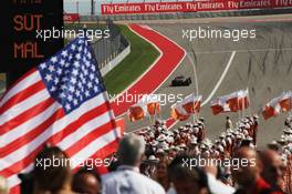 Romain Grosjean (FRA) Lotus F1 E22 heads to the grid. 02.11.2014. Formula 1 World Championship, Rd 17, United States Grand Prix, Austin, Texas, USA, Race Day.