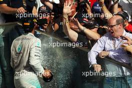 Race winner Lewis Hamilton (GBR) Mercedes AMG F1 celebrates on the podium. 02.11.2014. Formula 1 World Championship, Rd 17, United States Grand Prix, Austin, Texas, USA, Race Day.