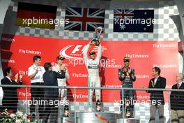 The podium (L to R): Nico Rosberg (GER) Mercedes AMG F1, second; Lewis Hamilton (GBR) Mercedes AMG F1, race winner; Daniel Ricciardo (AUS) Red Bull Racing, third. 02.11.2014. Formula 1 World Championship, Rd 17, United States Grand Prix, Austin, Texas, USA, Race Day.