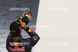 Daniel Ricciardo (AUS) Red Bull Racing celebrates his third position on the podium. 02.11.2014. Formula 1 World Championship, Rd 17, United States Grand Prix, Austin, Texas, USA, Race Day.